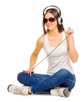 Young girl listen music isolated