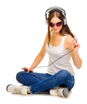 Young girl listen music isolated