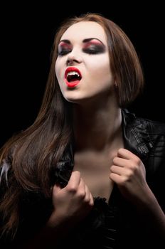 Young beautiful vampire woman isolated