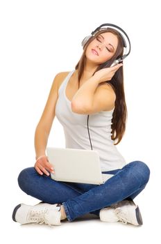 Young girl listen music by headphones isolated