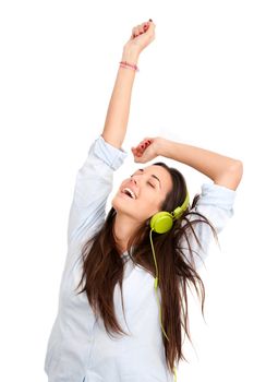 Young woman dancing in the rhythm with headphones.Isolated.