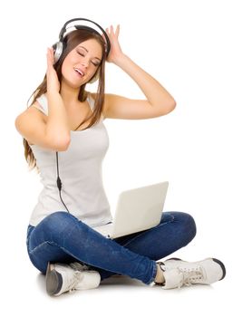 Young girl listen music isolated