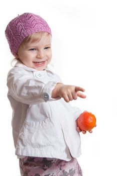 Smiling girl pointing at something isolated on white, focus on eyes