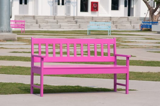 pink street chair in the park
