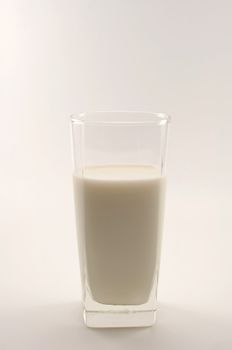 glass of milk on white background