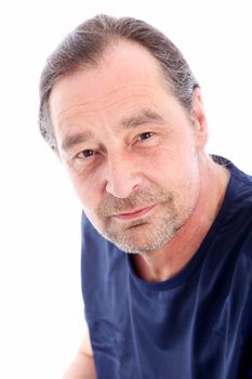 Closeup portrait of the face of a casual good looking middle-aged man looking at the camera isolated on white 