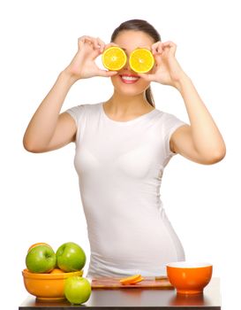 Young girl with orange slices isolated