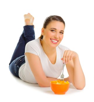 Young girl with fruit salad isolated