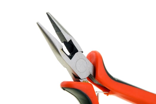 Steel pliers with plastic color handles on a white background