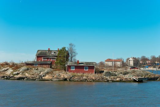 The traditional Finnish wooden houses on the island.