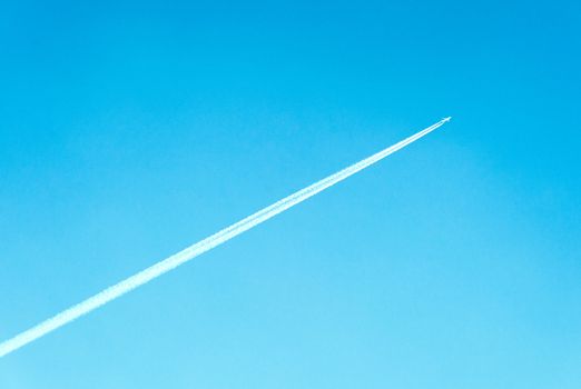 airplane in the blue sky