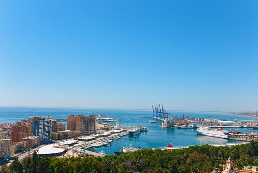 Handling of containers at the seaport city of Malaga.