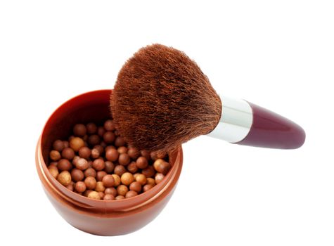 Powder brush in mineral make up ball powder isolated on white background