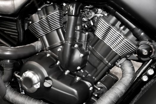 v-twin motorcycle engine close-up detail background