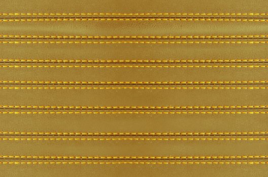 golden  horizontal stitched leather background and textures