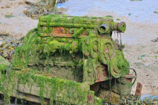 Old engine in mud