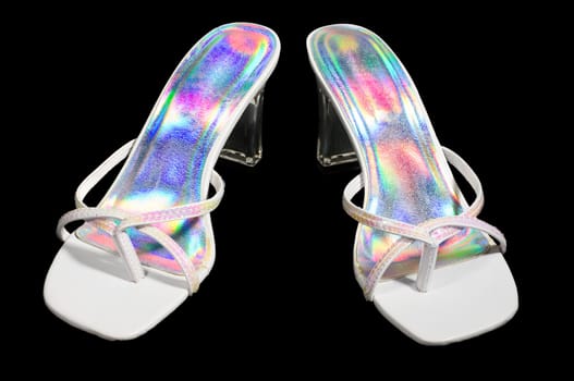 white and rainbow reflective sandels isolated on black.