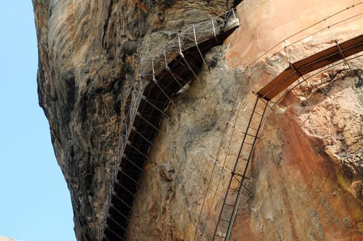 Tall and dangerous ladders on the cliffs