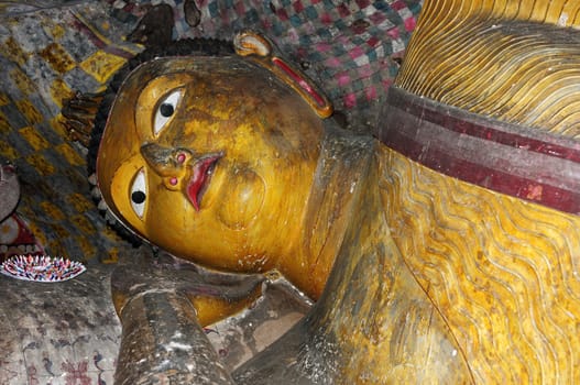 Closeup view of a historic lying buddha statue in Sri Lanka