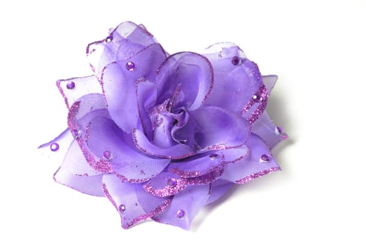 A flower hair clip for women on isolated white background.