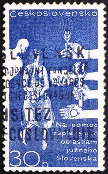 CZECHOSLOVAKIA - CIRCA 1965: a stamp printed in the Czechoslovakia shows Help for Danube Flood Victims in Slovakia, circa 1965