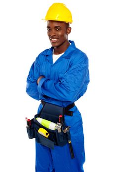 Smiling african worker posing with arms crossed isolated on white background