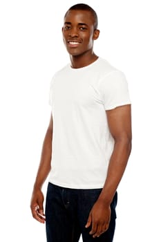 Casual young african man posing in front of camera