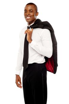 Portrait of handsome african businessman holding coat over his shoulders