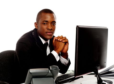 Portrait of a handsome african young executive posing for camera