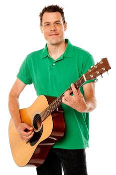 Smart rock guitar player at his best. Playing guitar against white background