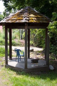 Outdoor office.  Chair and typewriter, the old days.  Low Tech