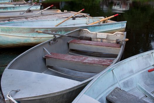 Boats tied to a dock.