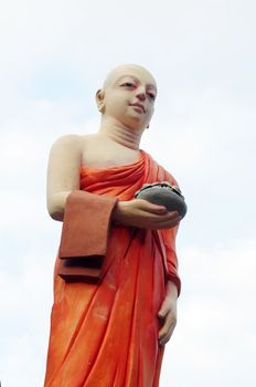Bottom view of a historic buddha statue in Sri Lanka