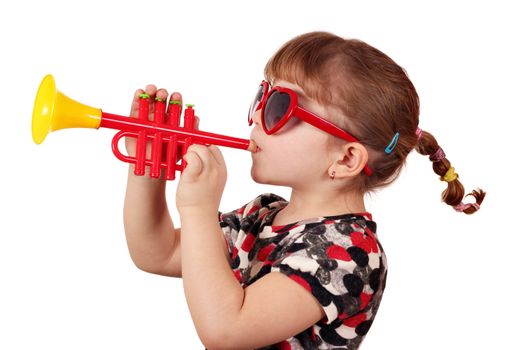 little girl with sunglasses play trumpet