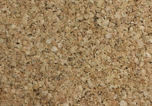 blank brown cork board background close up.