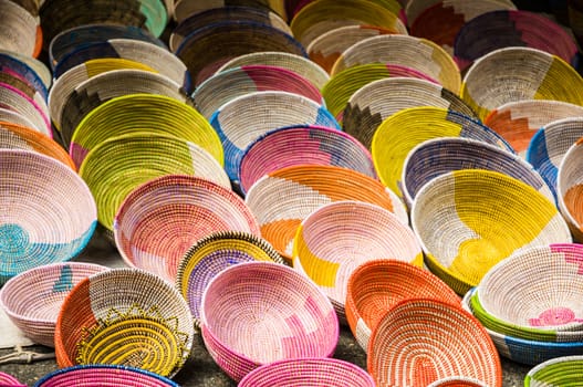 wall of empty colorful knit bowls