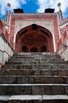 Humayun`s Tomb arch with stairway. Mughal architecture of 1565-72 A.D. Delhi, India