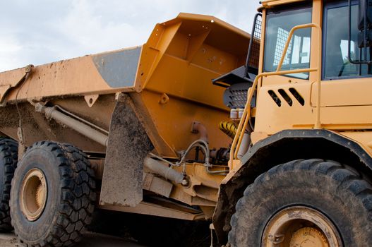 Huge dump truck being parked at a highway construction site in Germany
