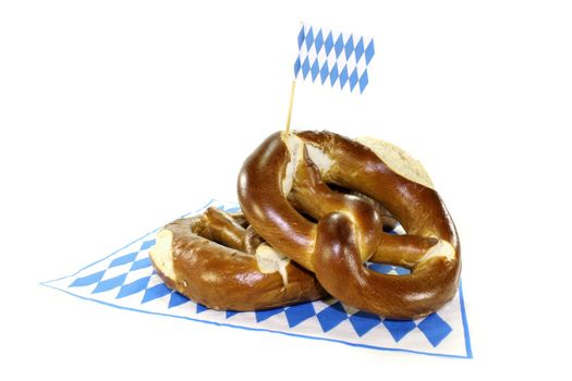 fresh baked Bavarian pretzels on a light background