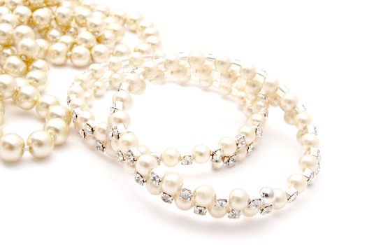 Beautiful Bracelet and necklace isolated on white background 