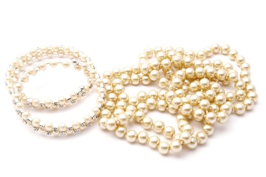 Beautiful Bracelet and necklace isolated on white background 
