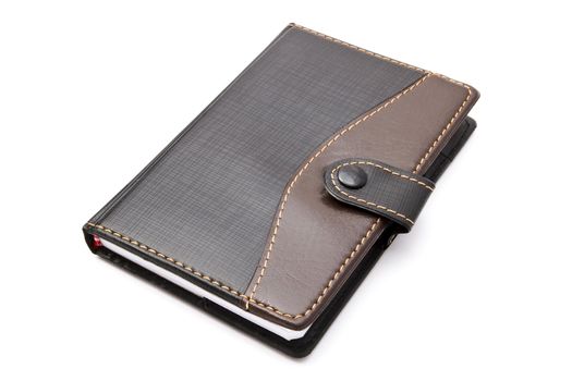Black notebook isolated on white background 