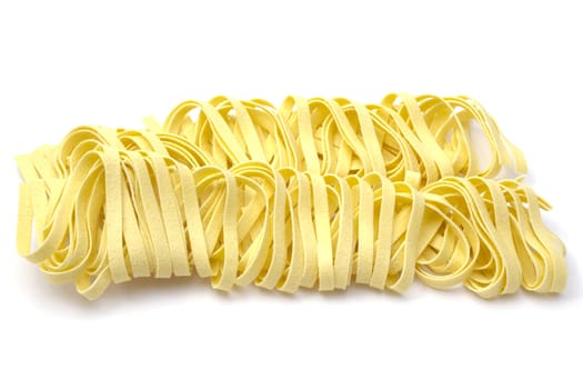 Spaghetti closeup on white background 
