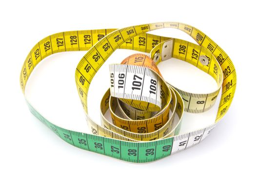 Tape measure closeup on white background 
