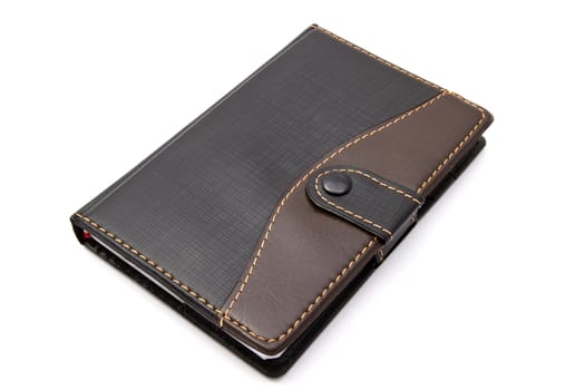 Black notebook isolated on white background 

