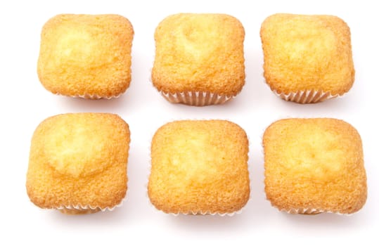 Delicious muffins isolated on white background
