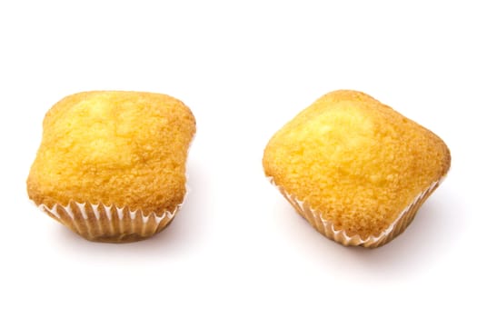 Delicious muffins isolated on white background