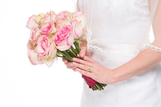 Young bride holding a bouquet on isolated white background with gold wedding ring.