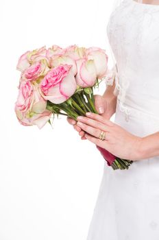 Young bride holding a bouquet on isolated white background with gold wedding ring.