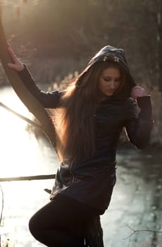 beautiful girl on the background of the river